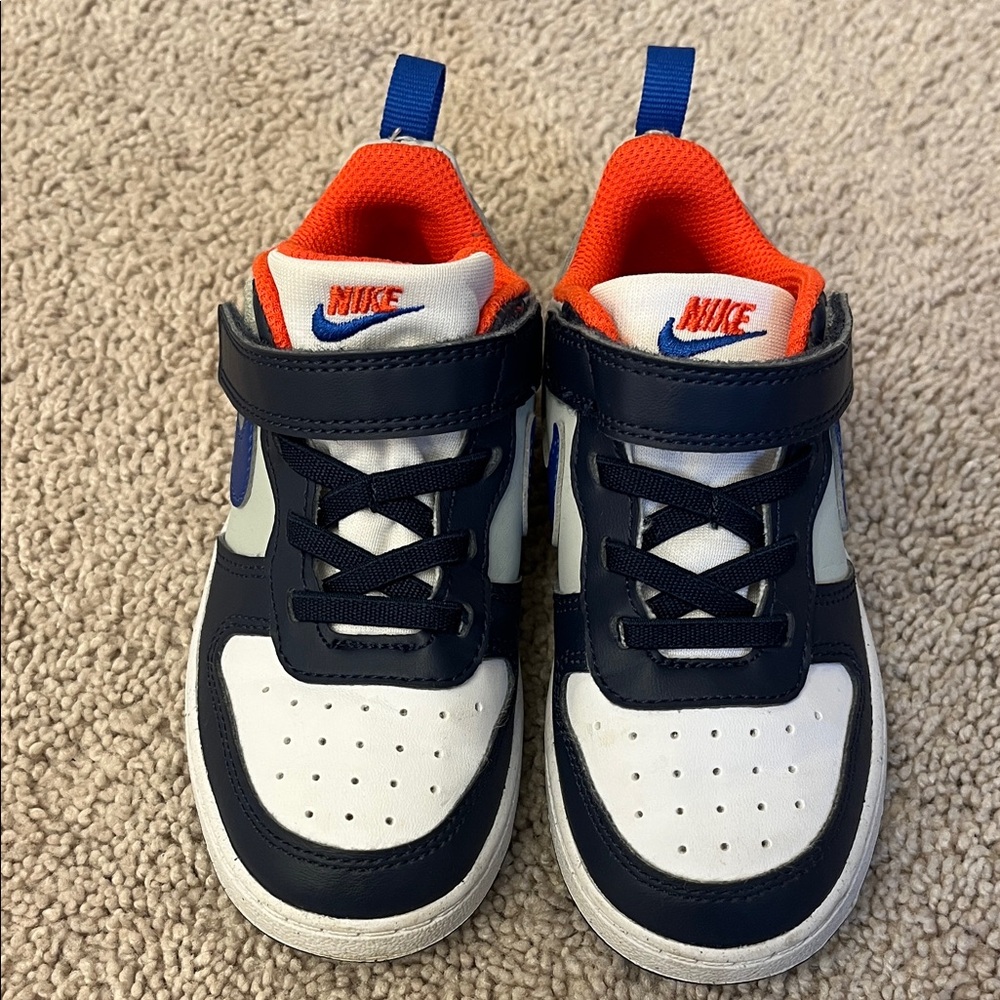 Nike Kids' Navy and White Sneakers with Orange Accents